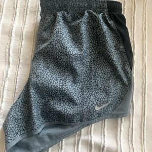 Grey spotted Nike running shorts